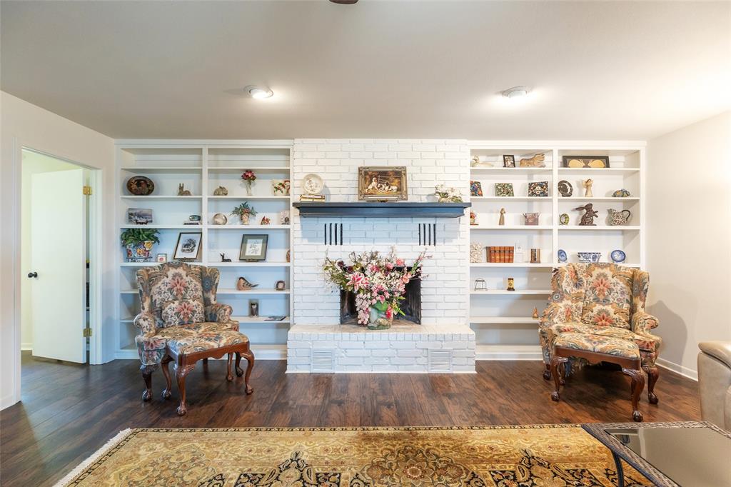 642 Fm 3200 Comanche, TX 76442 - Photo 13 of 37 a living room with furniture and a book shelf