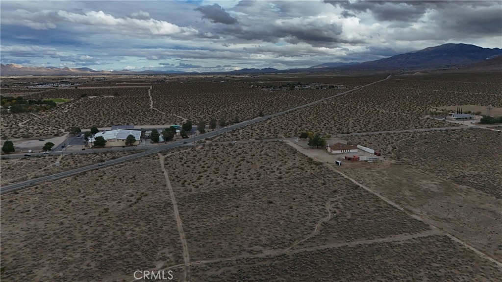785 Furst Street Lucerne Valley, CA 92356 - Photo 10 of 11 a view of a dry yard with wooden floor