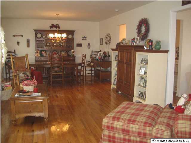 92 Jordan Road Brick, NJ 08724 - Photo 2 of 3 a bedroom with furniture and wooden floor