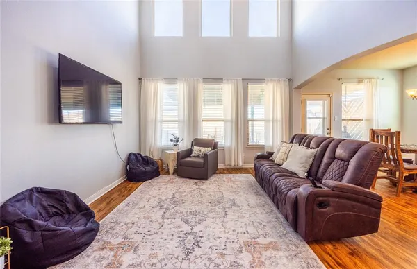 a bathroom with a double vanity sink mirror and shower