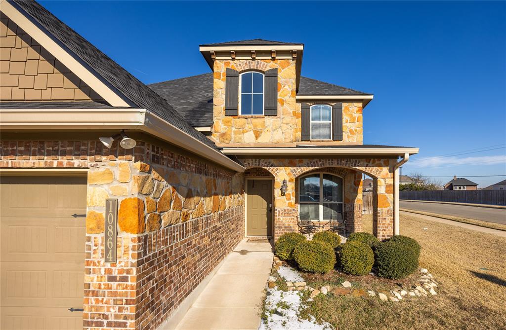 10864 Aurora Drive Waco, TX 76708 - Photo 3 of 40 a front view of a house with natural light