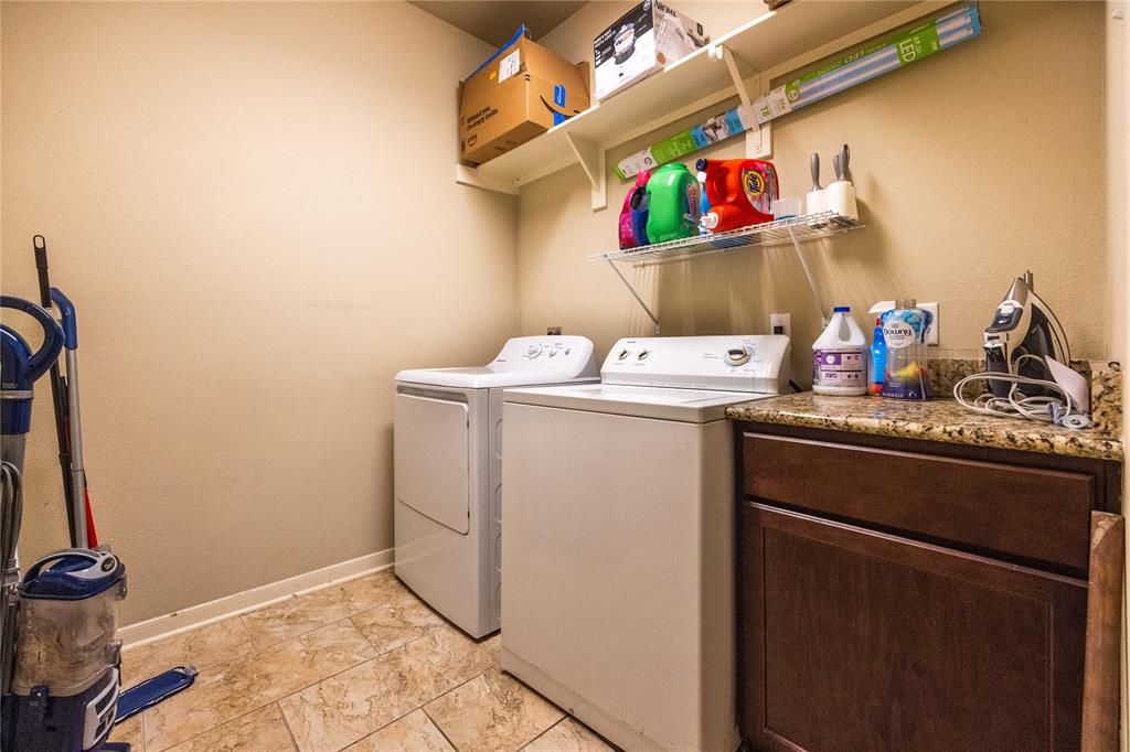 10864 Aurora Drive Waco, TX 76708 - Photo 33 of 40 a utility room with dryer and washer