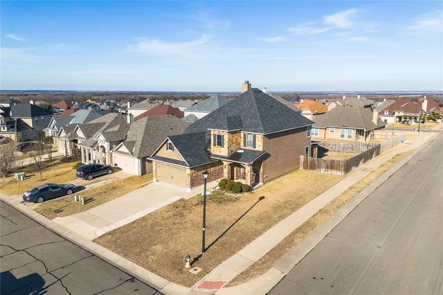 a view of swimming pool with an outdoor seating
