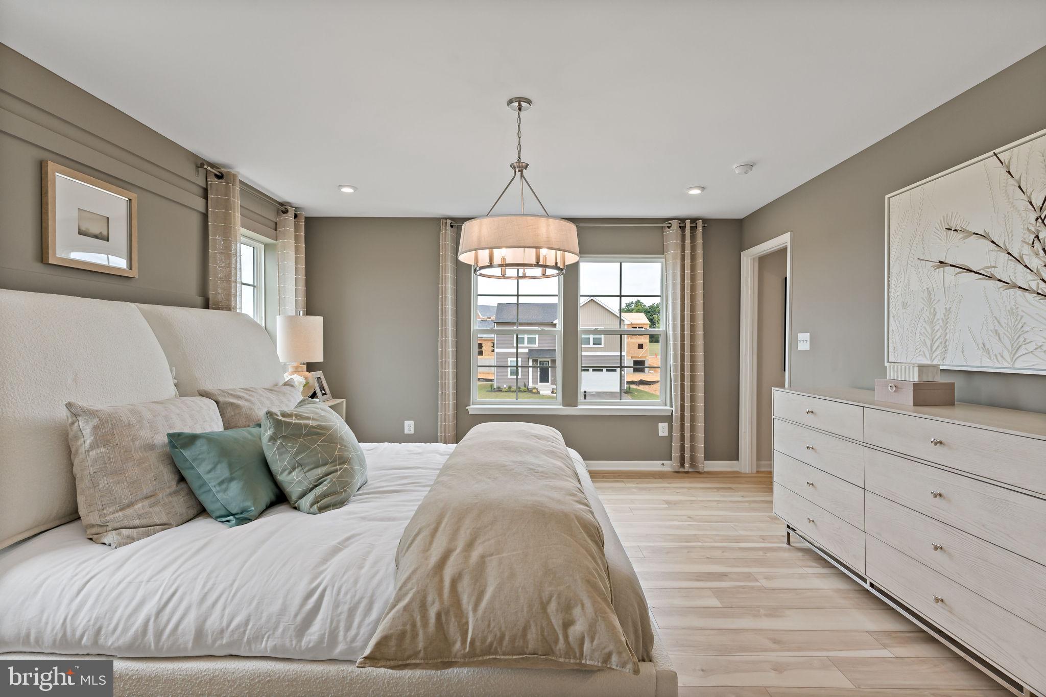 Tbb Heritage Drive, Unit WHITEHALL Hanover, PA 17331 - Photo 18 of 55 a spacious bedroom with a large bed and a window