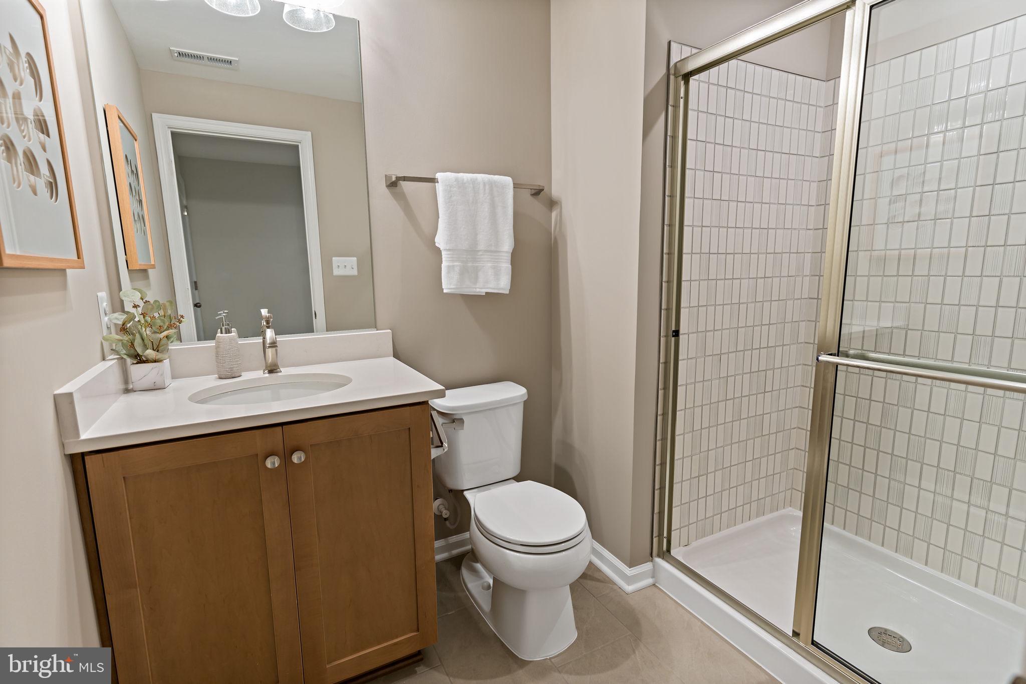Tbb Heritage Drive, Unit WHITEHALL Hanover, PA 17331 - Photo 42 of 55 a bathroom with a sink a toilet and shower