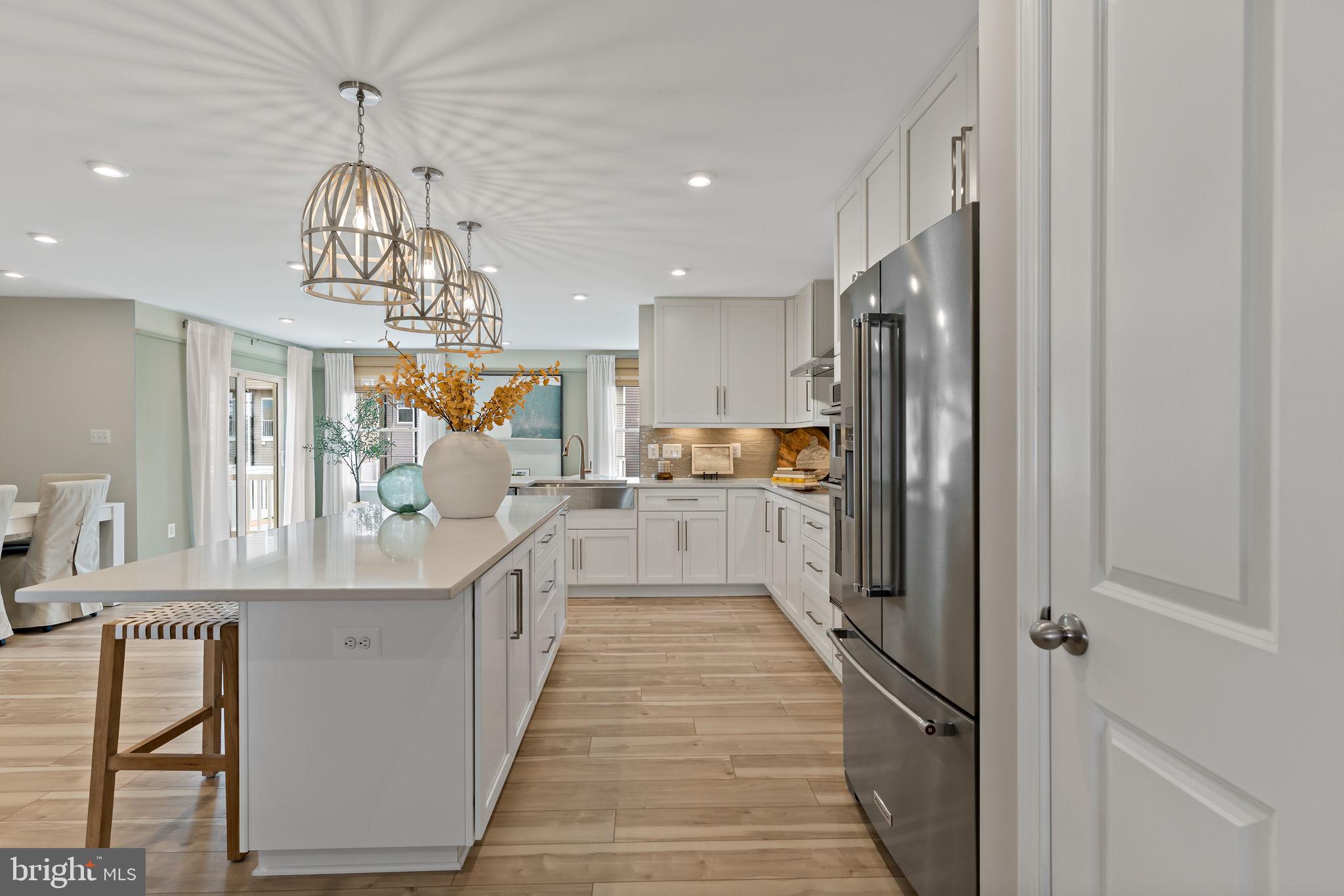 Tbb Heritage Drive, Unit WHITEHALL Hanover, PA 17331 - Photo 5 of 55 a kitchen with stainless steel appliances granite countertop a refrigerator and a sink