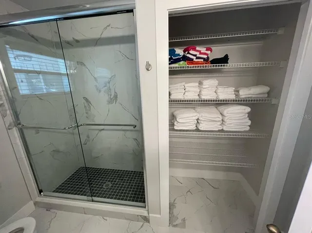 a room with storage and utility