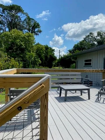 a view of a lake with a big yard