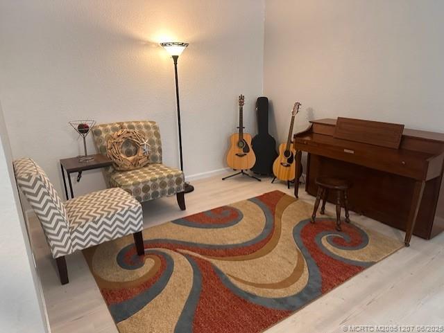 324 Southeast Bloxham Way Stuart, FL 34997 - Photo 13 of 35 a room with furniture and gym equipment