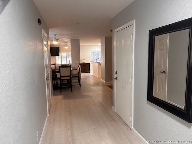 324 Southeast Bloxham Way Stuart, FL 34997 - Photo 20 of 35 a view of a livingroom with furniture and a window