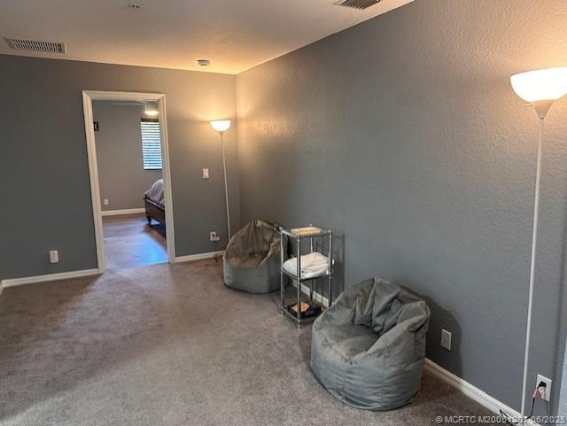 324 Southeast Bloxham Way Stuart, FL 34997 - Photo 8 of 35 a living room with furniture and a chandelier