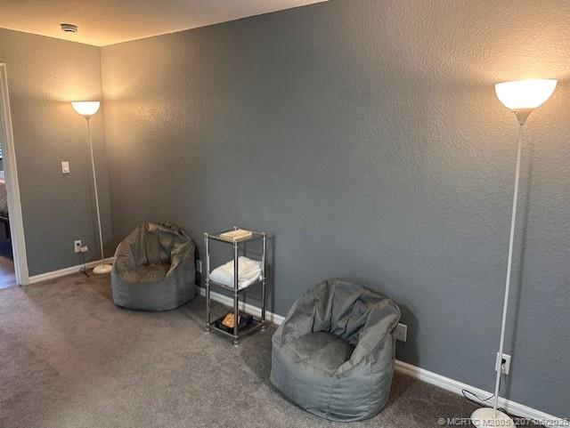 324 Southeast Bloxham Way Stuart, FL 34997 - Photo 9 of 35 a room with furniture and a potted plant