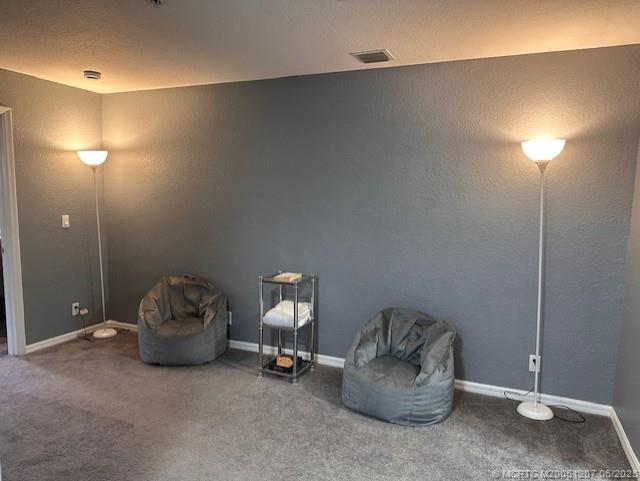 324 Southeast Bloxham Way Stuart, FL 34997 - Photo 10 of 35 a room with furniture and a potted plant