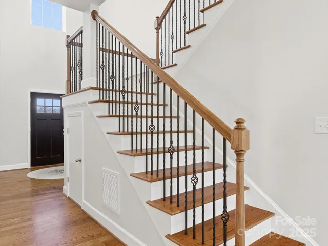 a view of entryway with wooden floor