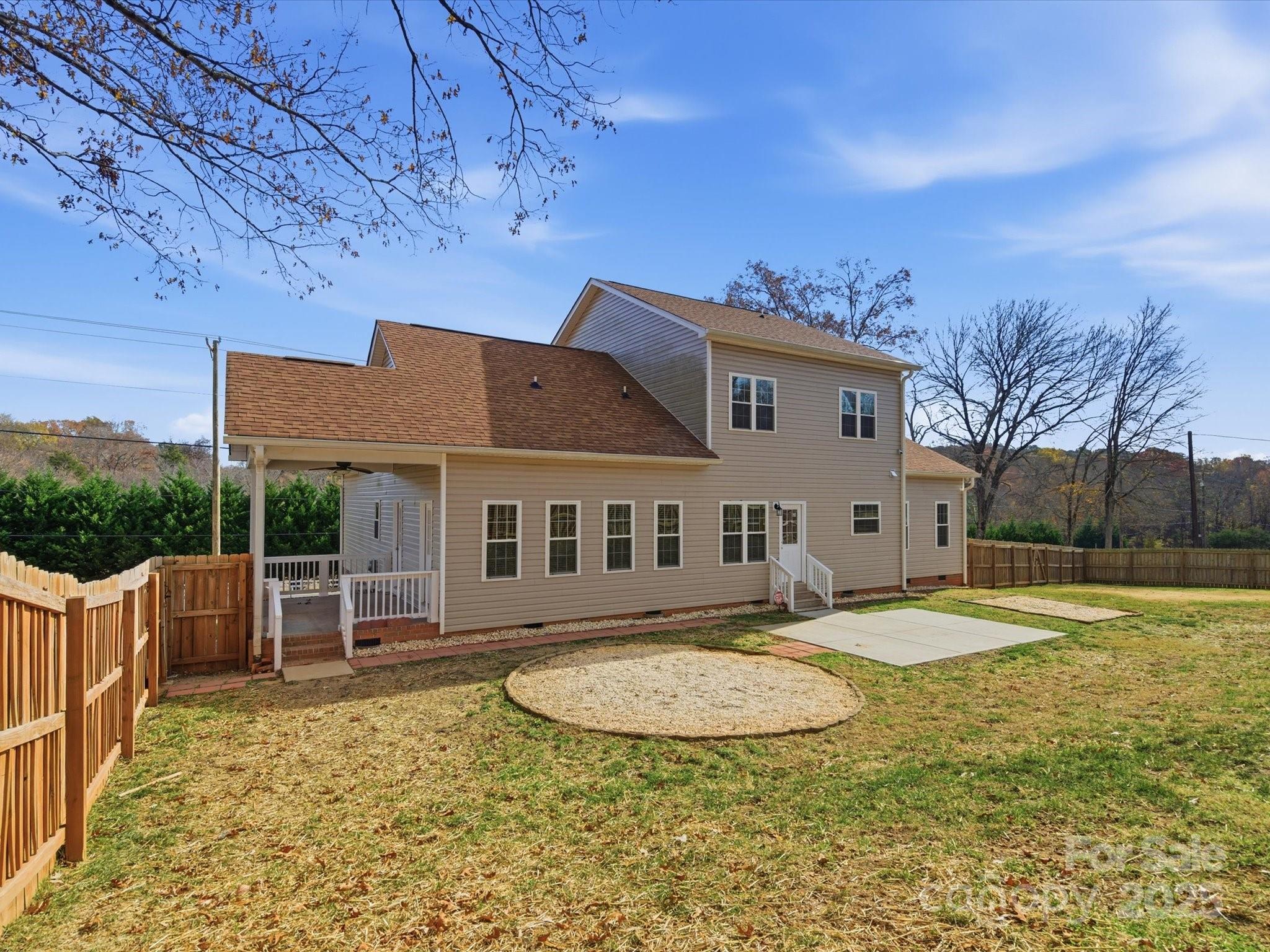 3211 Oakdale Road Charlotte, NC 28216 - Photo 37 of 43 a view of a house with a backyard