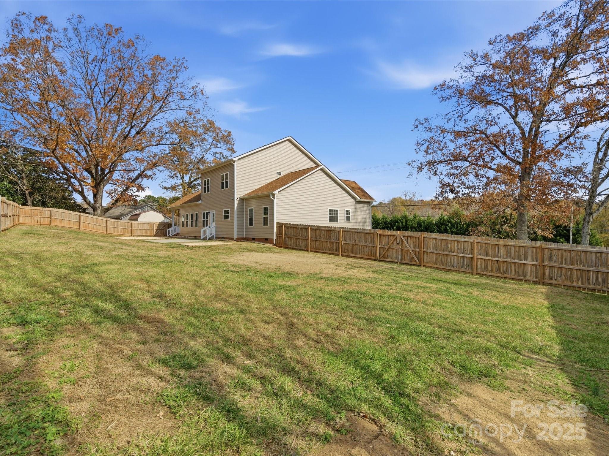 3211 Oakdale Road Charlotte, NC 28216 - Photo 39 of 43 a view of a backyard with large trees
