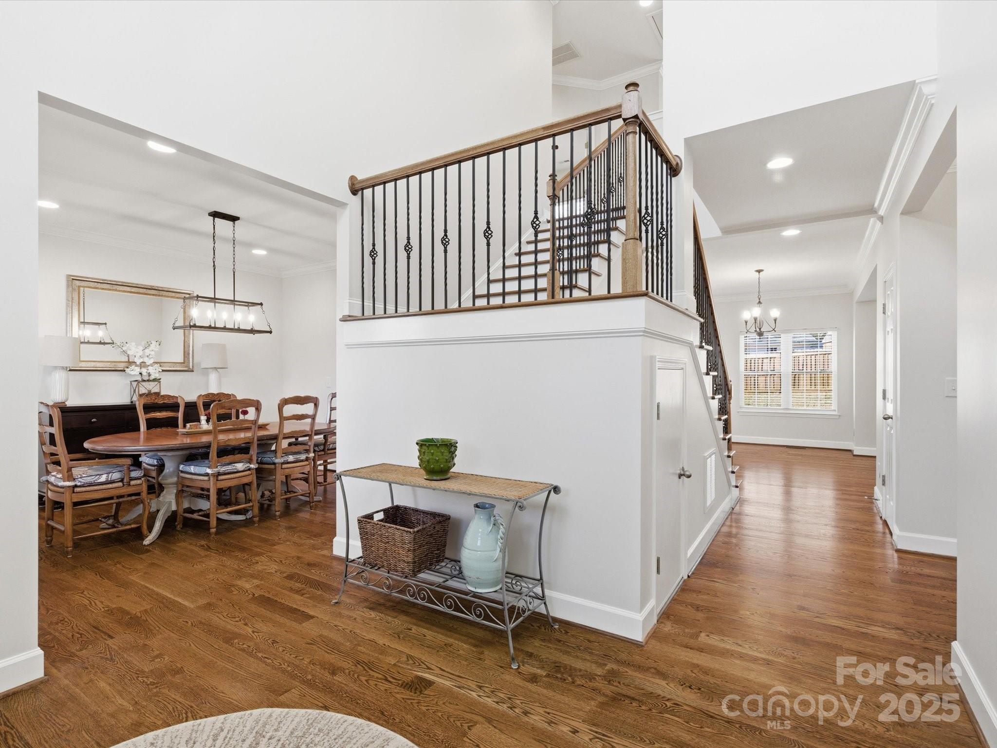 3211 Oakdale Road Charlotte, NC 28216 - Photo 4 of 43 a living room with furniture and a wooden floor