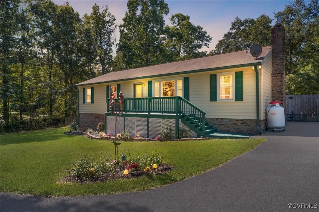 10459 Rockingham Road Mechanicsville, VA 23116 - Photo 1 of 48 Ranch-style house with a lawn