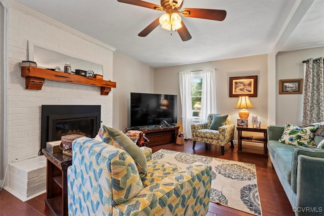 10459 Rockingham Road Mechanicsville, VA 23116 - Photo 13 of 48 Living room with a brick fireplace, ceiling fan, a