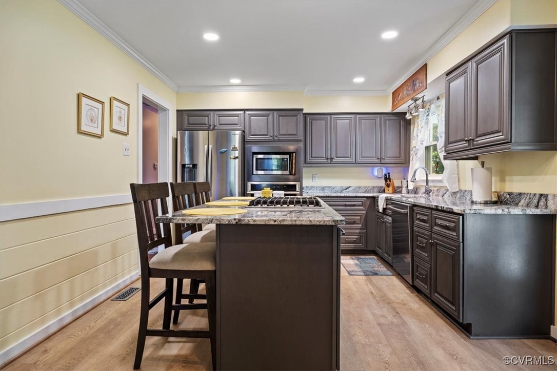 10459 Rockingham Road Mechanicsville, VA 23116 - Photo 16 of 48 Kitchen featuring light wood-type flooring, light