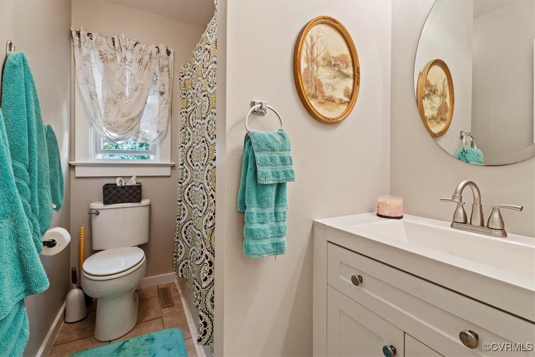 10459 Rockingham Road Mechanicsville, VA 23116 - Photo 25 of 48 Bathroom with updated vanity and tile patterned fl
