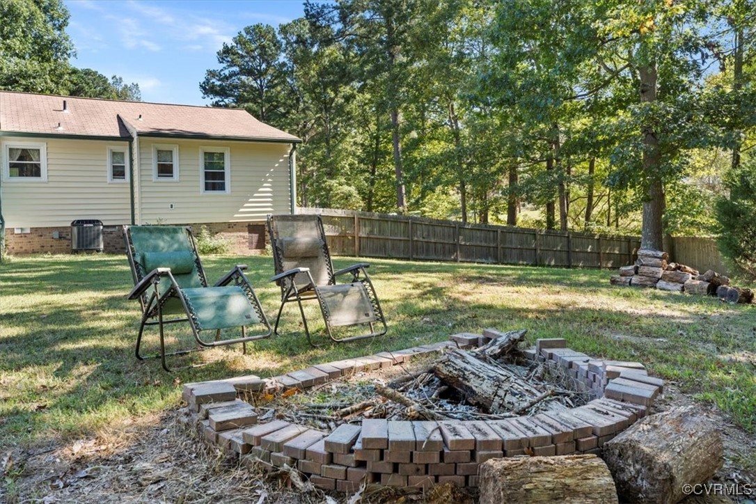 10459 Rockingham Road Mechanicsville, VA 23116 - Photo 39 of 48 View of yard with a fire pit