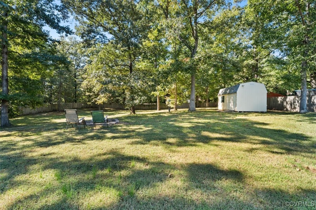 10459 Rockingham Road Mechanicsville, VA 23116 - Photo 40 of 48 View of yard featuring a shed