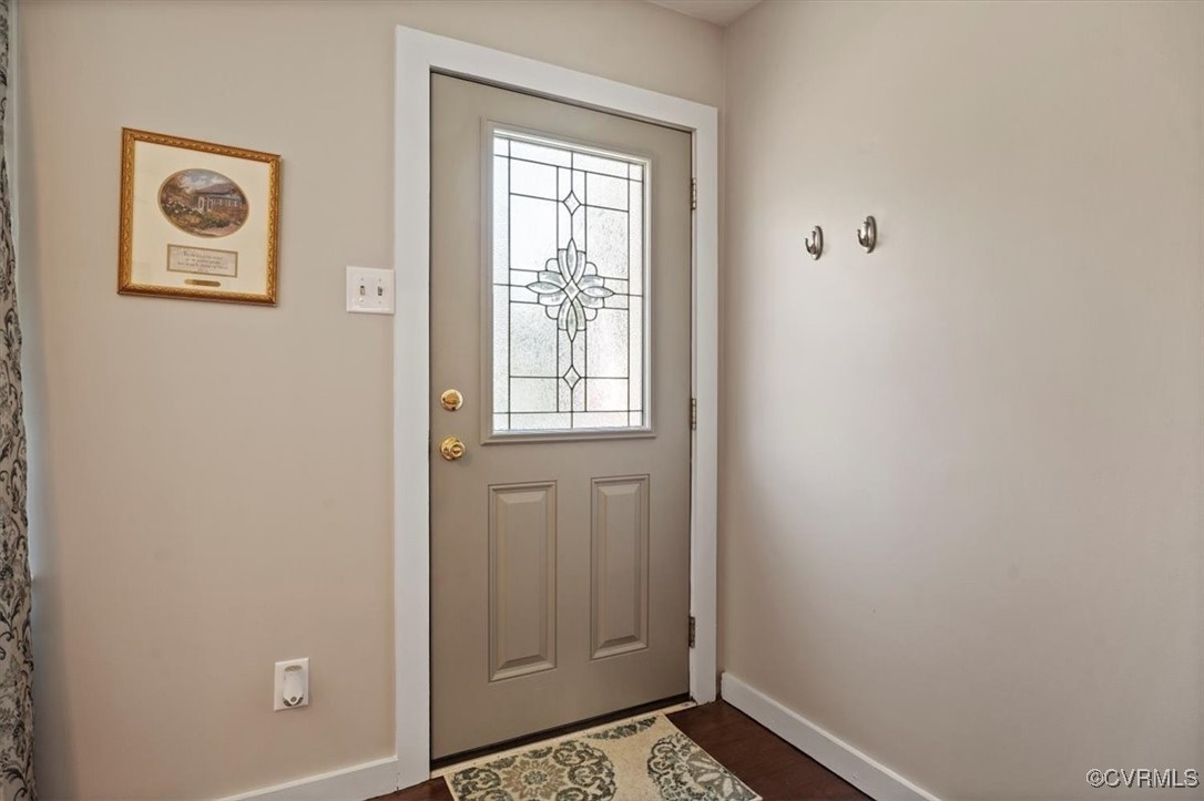 10459 Rockingham Road Mechanicsville, VA 23116 - Photo 8 of 48 Doorway to outside featuring dark wood-type floori
