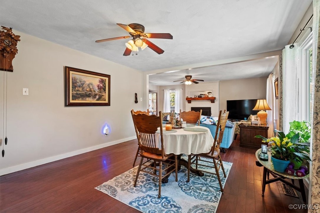 10459 Rockingham Road Mechanicsville, VA 23116 - Photo 9 of 48 Dining space with ceiling fan and dark hardwood /