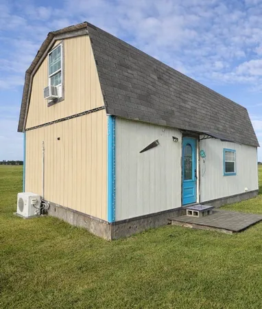 a view of a backyard with a garden