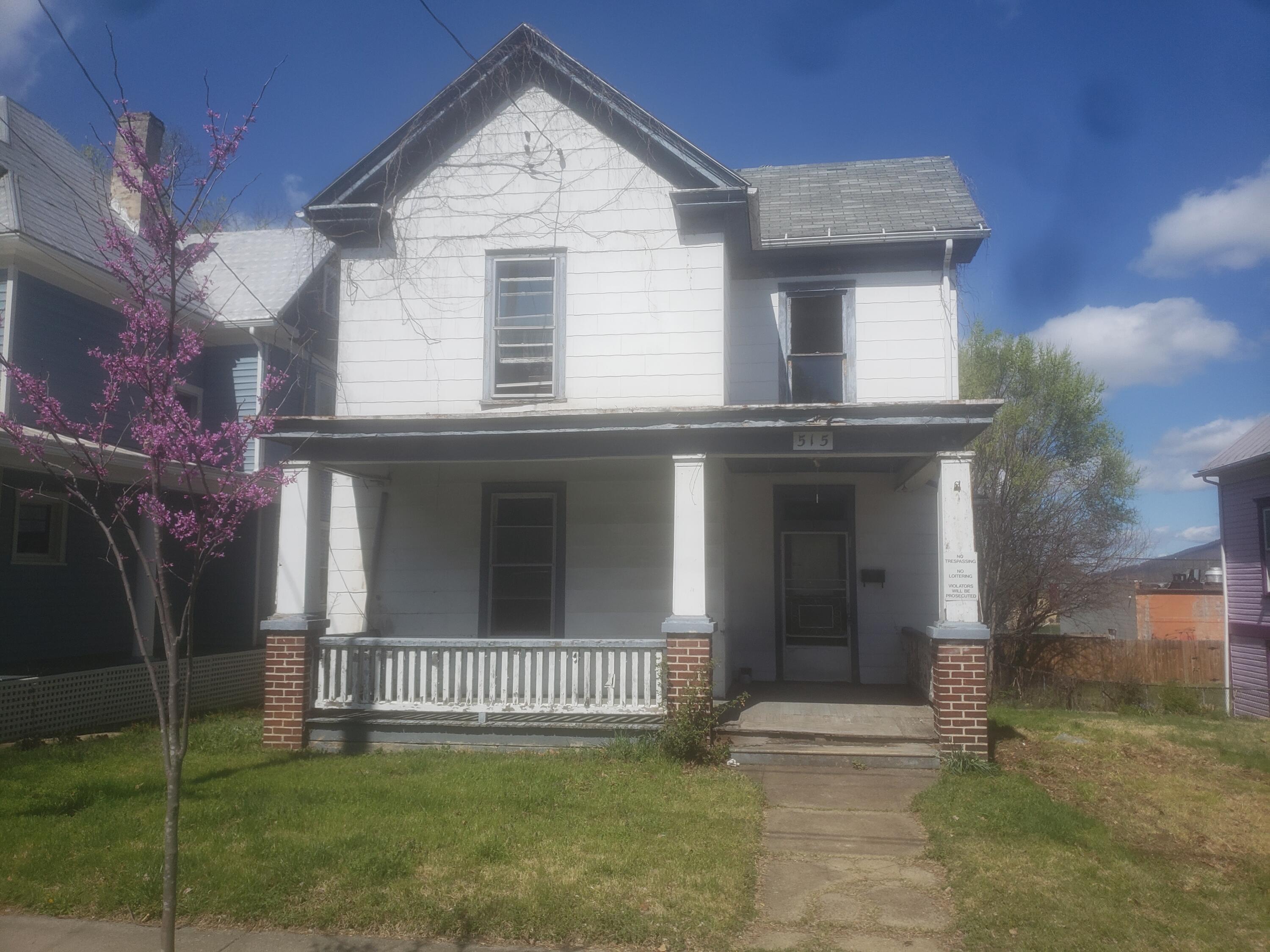 515 Mountain Avenue Southwest Roanoke, VA 24016 - Photo 1 of 13 a view of a brick house with many windows