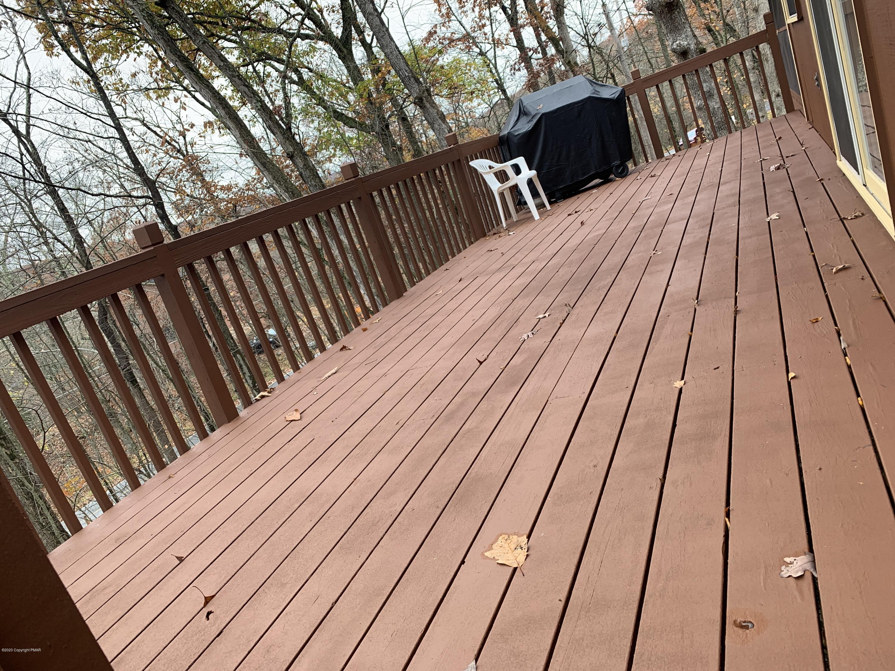 192 Salisbury Road Bushkill, PA 18324 - Photo 9 of 28 a view of balcony with wooden floor and fence