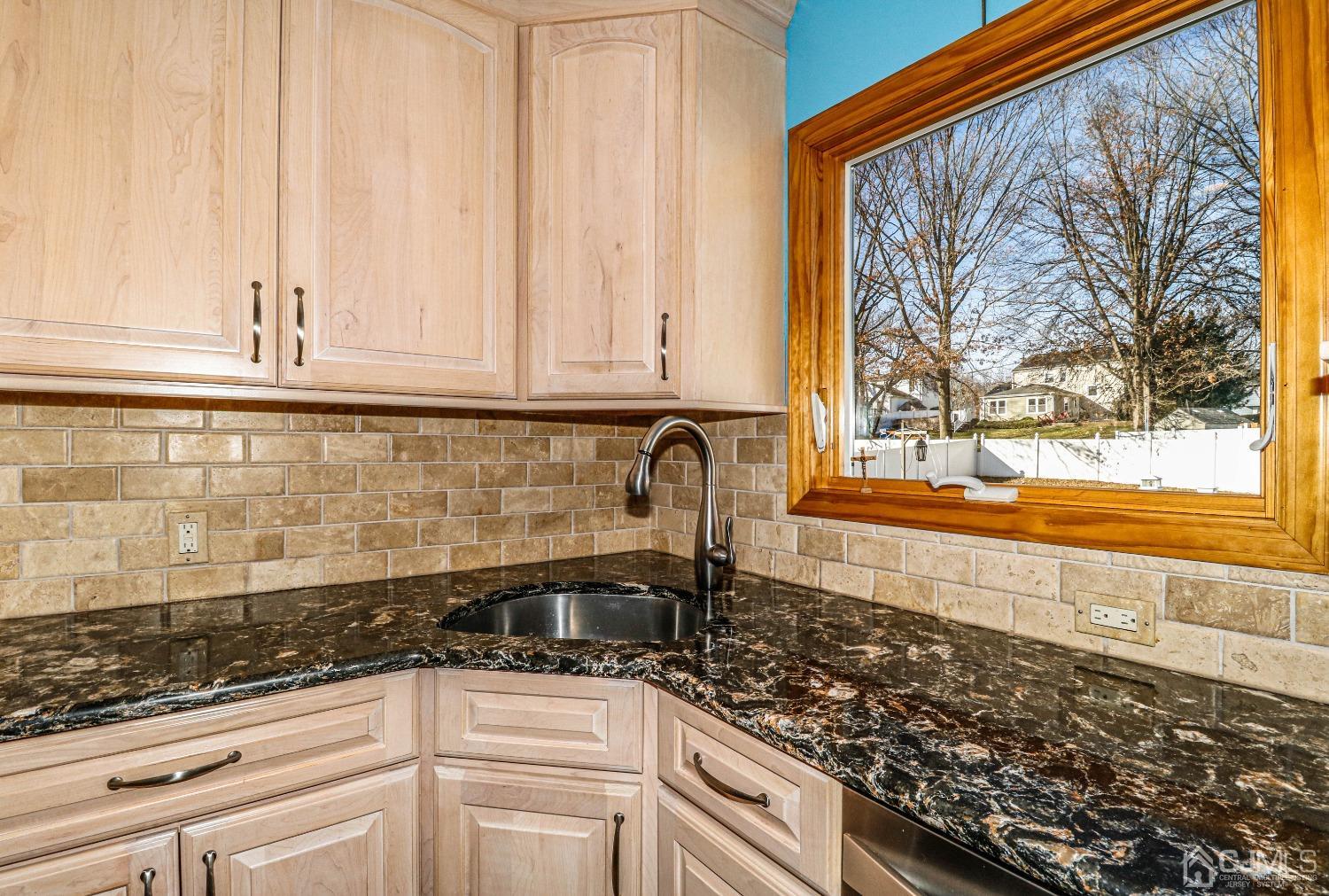 22 Hill Road Edison, NJ 08817 - Photo 14 of 38 a kitchen with a sink and cabinets