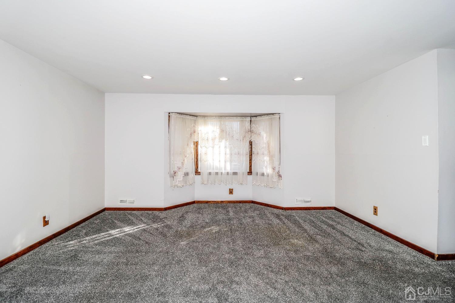 22 Hill Road Edison, NJ 08817 - Photo 19 of 38 a view of an empty room with a window