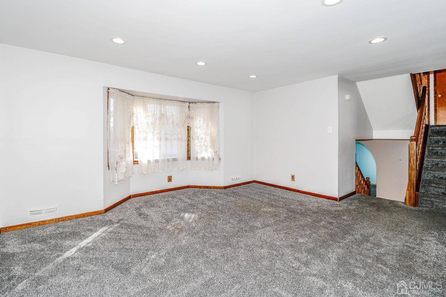 22 Hill Road Edison, NJ 08817 - Photo 21 of 38 a view of an empty room with a window