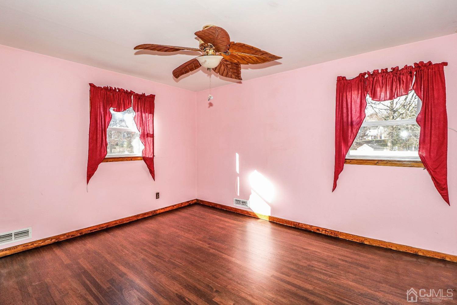 22 Hill Road Edison, NJ 08817 - Photo 22 of 38 a view of empty room with wooden floor