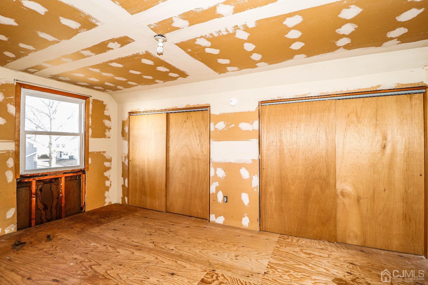 22 Hill Road Edison, NJ 08817 - Photo 27 of 38 a view of an empty room with a window