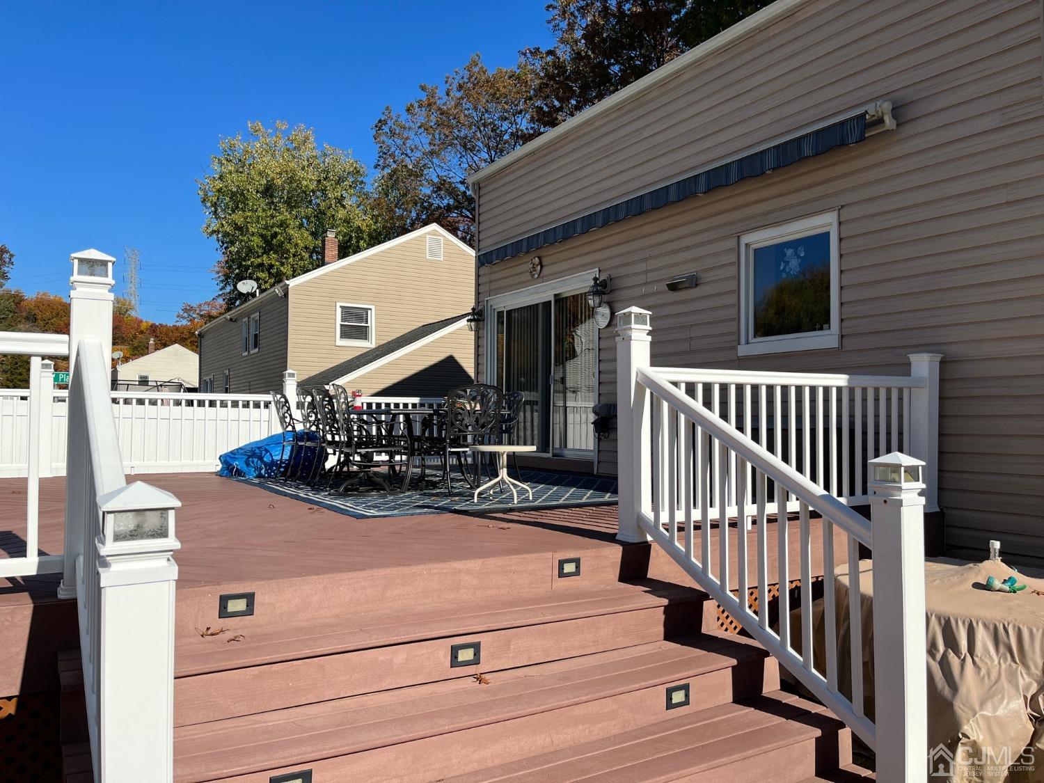 22 Hill Road Edison, NJ 08817 - Photo 32 of 38 a view of entryway and hall with wooden floor