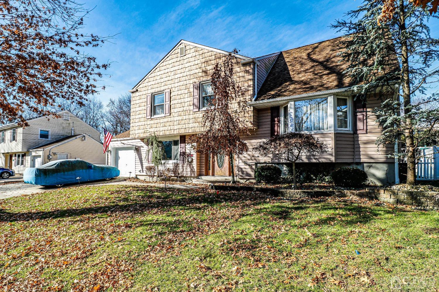 22 Hill Road Edison, NJ 08817 - Photo 34 of 38 a view of a house with a yard