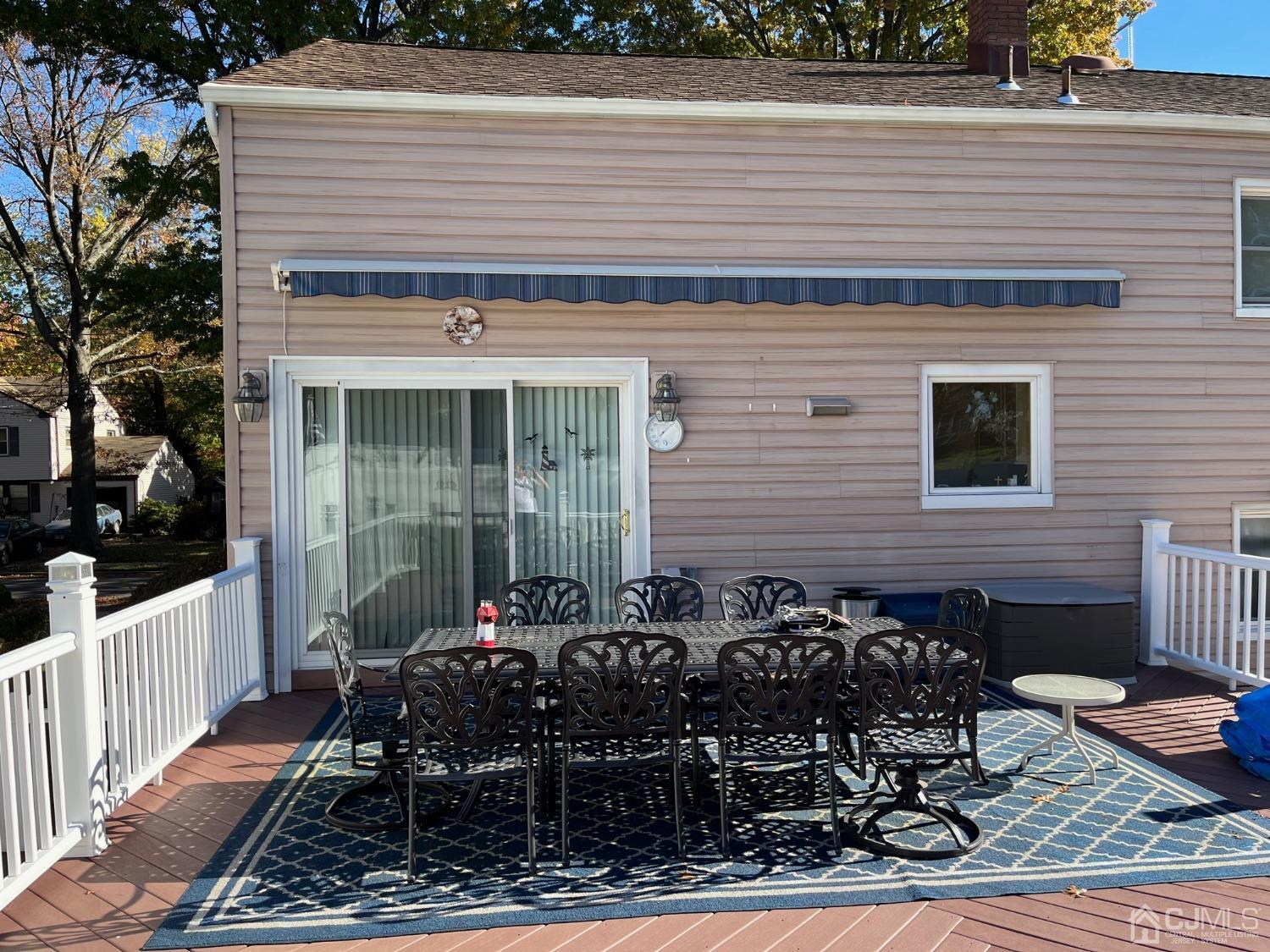 22 Hill Road Edison, NJ 08817 - Photo 7 of 38 a backyard of a house with table and chairs