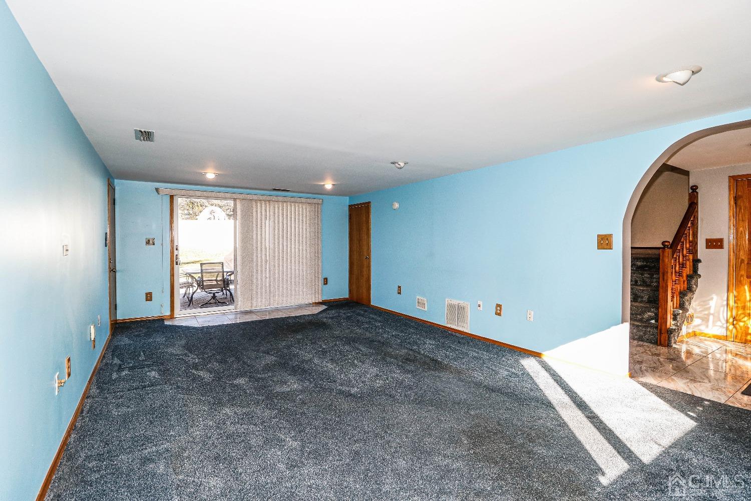 22 Hill Road Edison, NJ 08817 - Photo 10 of 38 a view of a livingroom with wooden floor and a window