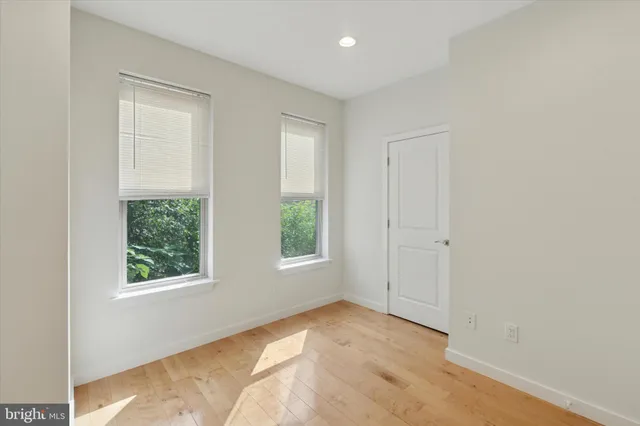 an empty room with windows