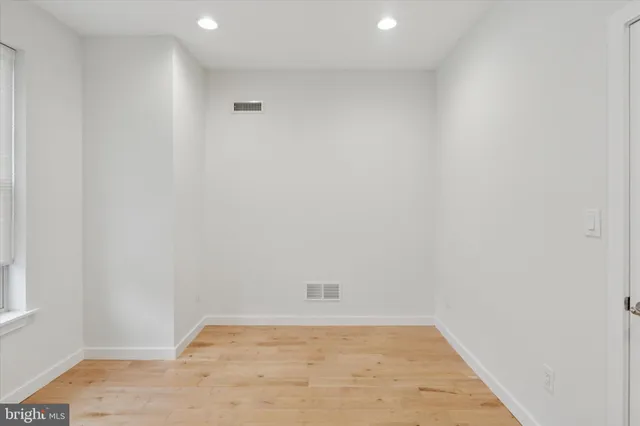 an empty room with a workbench