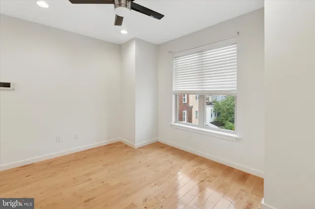 a bathroom with a bathtub and a toilet