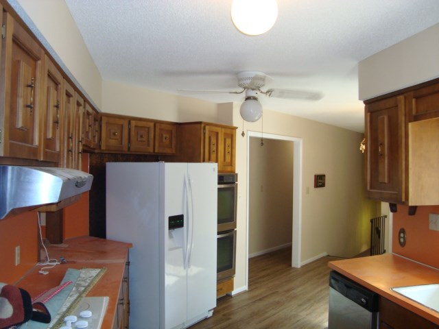 1400 Hubbard Road Columbus, GA 31904 - Photo 17 of 31 a kitchen with stainless steel appliances a refrigerator and a stove