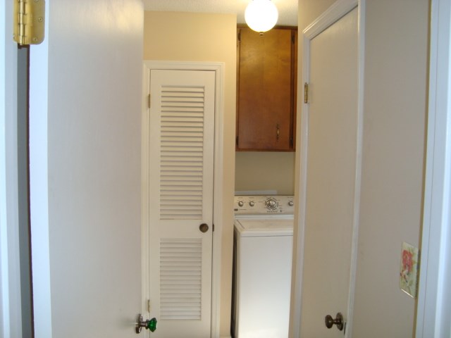 1400 Hubbard Road Columbus, GA 31904 - Photo 20 of 31 a bathroom with a shower and a door