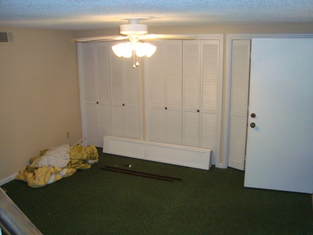 1400 Hubbard Road Columbus, GA 31904 - Photo 28 of 31 a bathroom with a light fixture and a fan