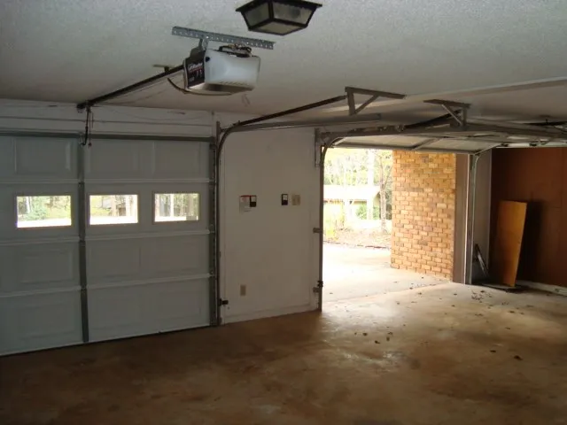 a view of a room with window and stairs