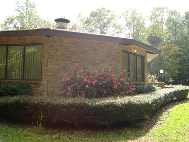 a front view of house with yard