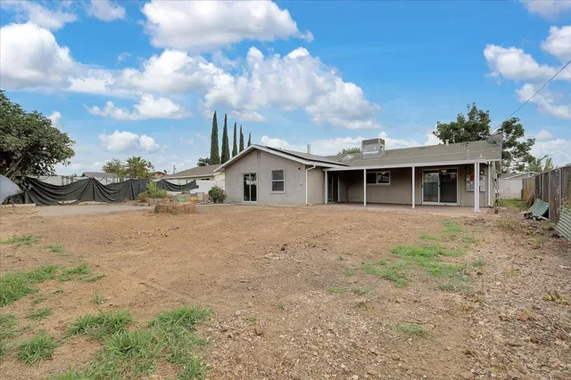 a view of a house with a patio